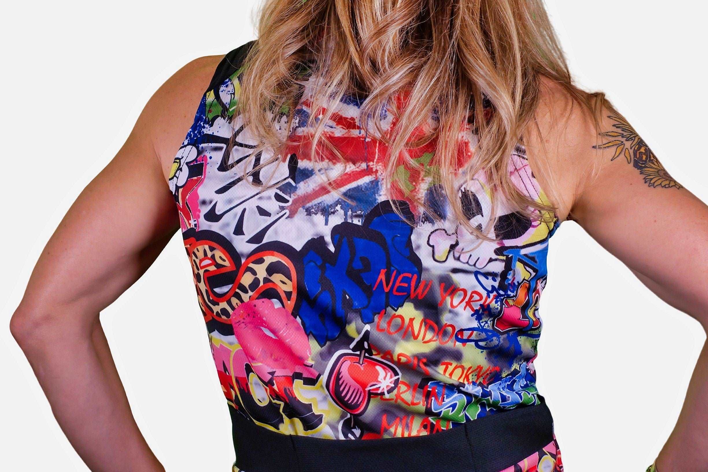 Graffiti print sports dress with flattering drop waist and moisture-wicking fabric.